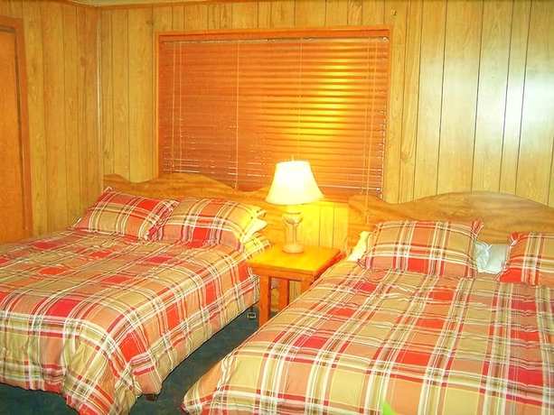 Imagen de la habitación del Hotel Golden Bear Cottages. Foto 14