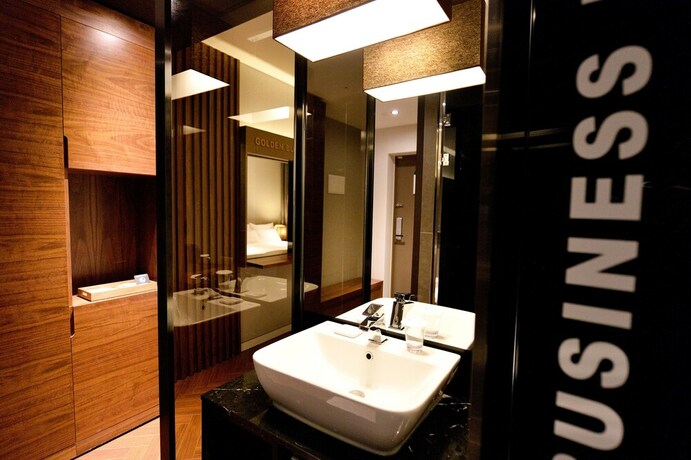 Imagen de la habitación del Hotel Golden Business. Foto 13