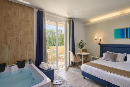 Imagen de la habitación del Hotel Golden, Cecina. Foto 18