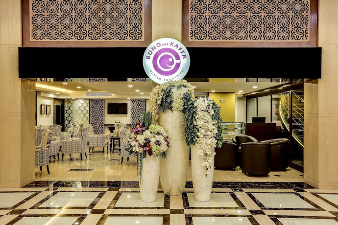 Imagen del bar/restaurante del Hotel Golden Chariot Vasai Hotel And Spa. Foto 5