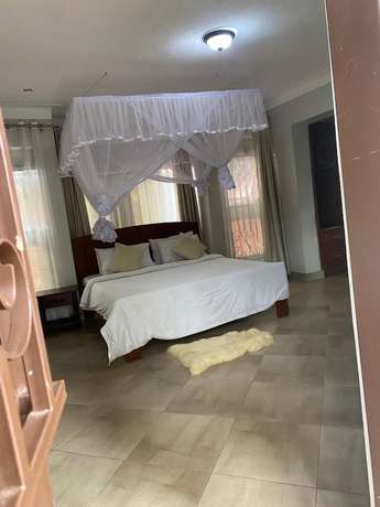 Imagen de la habitación del Hotel Golden Cherries Guest House. Foto 18