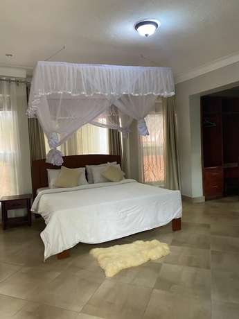 Imagen de la habitación del Hotel Golden Cherries Guest House. Foto 19