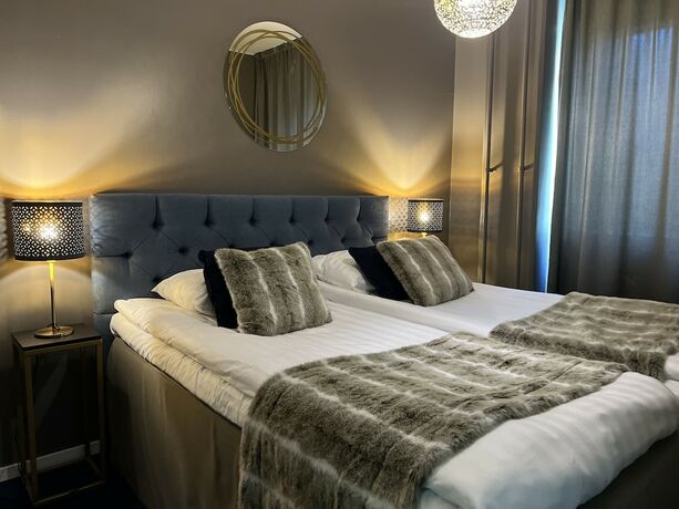 Imagen de la habitación del Hotel Golden Circle Suites. Foto 19
