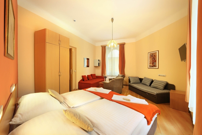 Imagen de la habitación del Hotel Golden City Garni. Foto 7