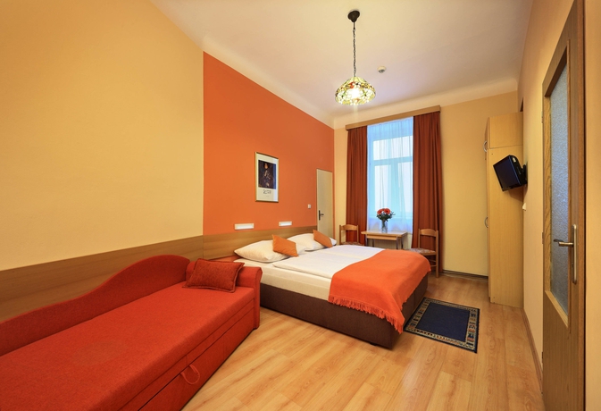 Imagen de la habitación del Hotel Golden City Garni. Foto 10