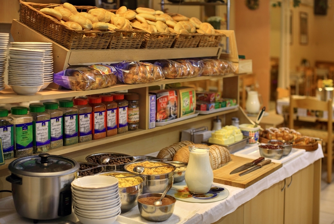 Imagen del bar/restaurante del Hotel Golden City Garni. Foto 5