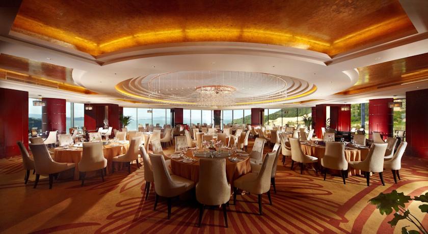 Imagen del bar/restaurante del Hotel Golden Coast New Century Resort - Wenzhou. Foto 5