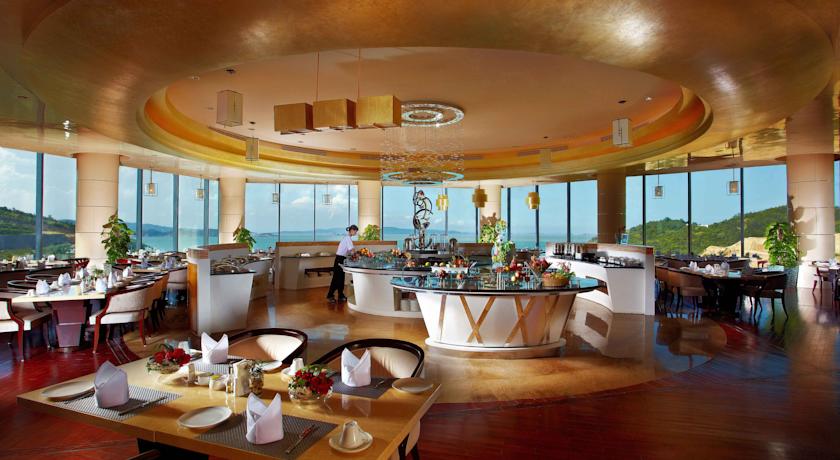 Imagen del bar/restaurante del Hotel Golden Coast New Century Resort - Wenzhou. Foto 6