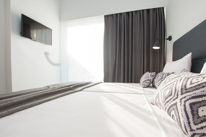 Imagen de la habitación del Hotel Golden Coast Resort. Foto 5