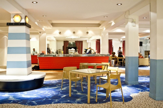 Imagen del bar/restaurante del Hotel Golden Coast and Bungalows - All Inclusive. Foto 2