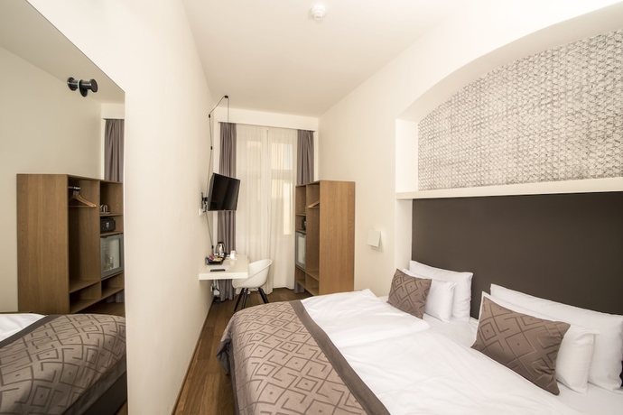 Imagen de la habitación del Hotel Golden Crown, Praga. Foto 11