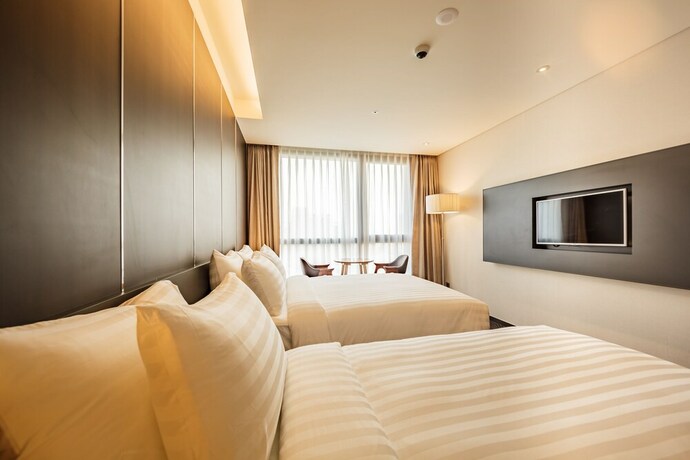 Imagen de la habitación del Hotel Golden Daisy Hotel. Foto 3