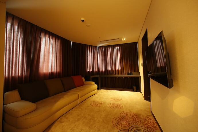 Imagen de la habitación del Hotel Golden Daisy Hotel. Foto 10