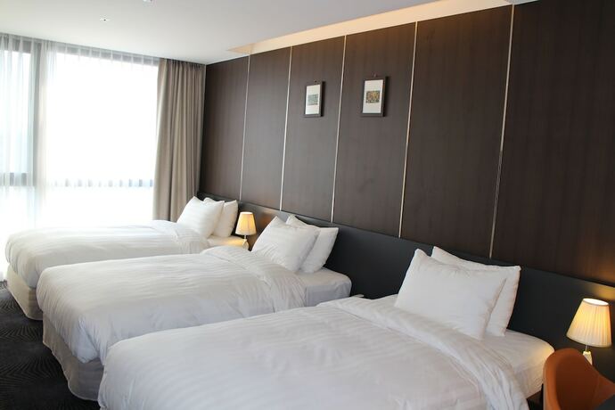 Imagen de la habitación del Hotel Golden Daisy Hotel. Foto 12