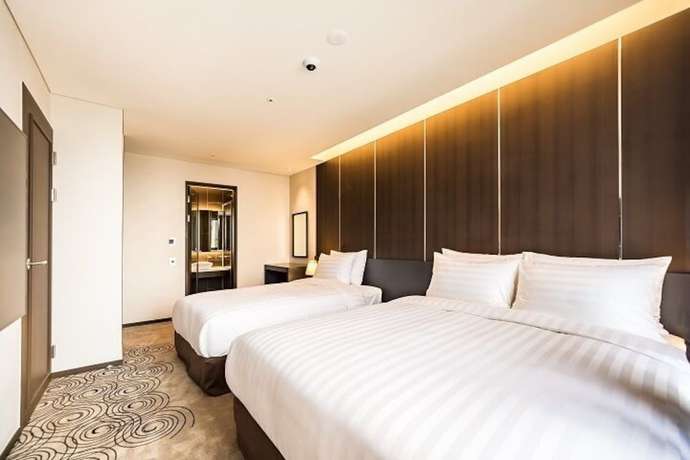 Imagen de la habitación del Hotel Golden Daisy Seogwipo Ocean. Foto 6