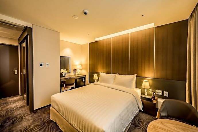 Imagen de la habitación del Hotel Golden Daisy Seogwipo Ocean. Foto 7