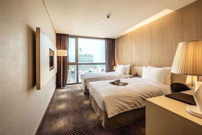 Imagen de la habitación del Hotel Golden Daisy Seogwipo Ocean. Foto 8