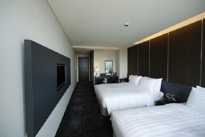Imagen de la habitación del Hotel Golden Daisy Seogwipo Ocean. Foto 9