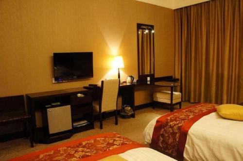 Imagen de la habitación del Hotel Golden Dragonball. Foto 8