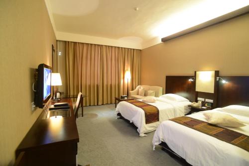 Imagen de la habitación del Hotel Golden Dragonball. Foto 9