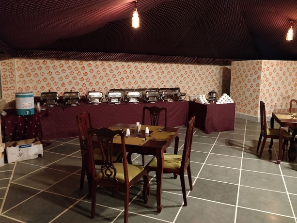 Imagen del bar/restaurante del Hotel Golden Dune Camp. Foto 10