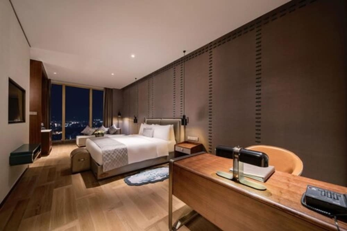 Imagen de la habitación del Hotel Golden Eagle International. Foto 10
