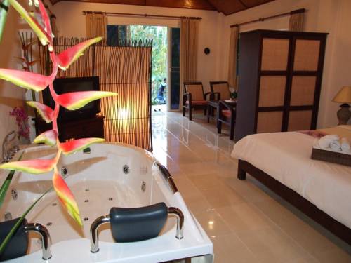 Imagen de la habitación del Hotel Golden Elephant Resort. Foto 12