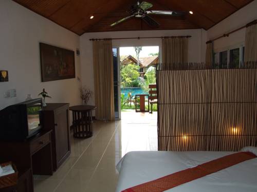 Imagen de la habitación del Hotel Golden Elephant Resort. Foto 14