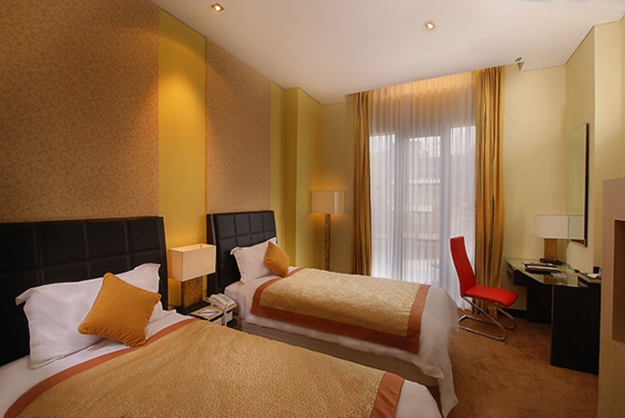 Imagen de la habitación del Hotel Golden Flower Bandung. Foto 2
