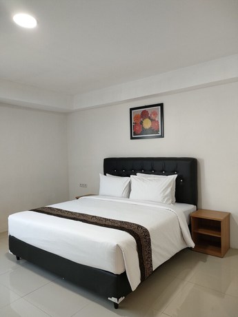 Imagen de la habitación del Hotel Golden Ganesha Yogyakarta by Ecommerceloka. Foto 8