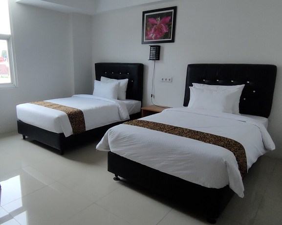 Imagen de la habitación del Hotel Golden Ganesha Yogyakarta by Ecommerceloka. Foto 9