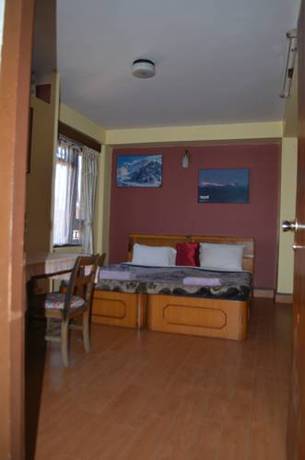 Imagen de la habitación del Hotel Golden Gate Guest House. Foto 7