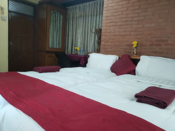 Imagen de la habitación del Hotel Golden Gate Guest House. Foto 13