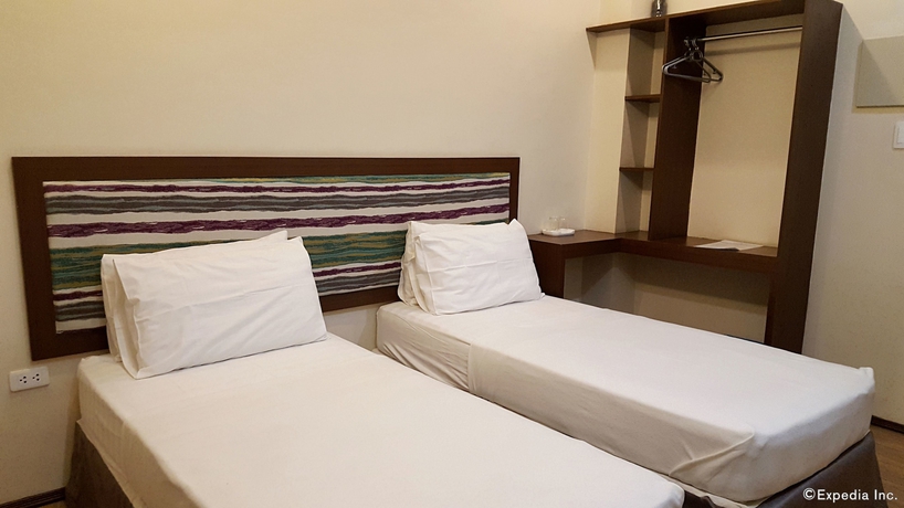 Imagen de la habitación del Hotel Golden Gate Suites. Foto 8