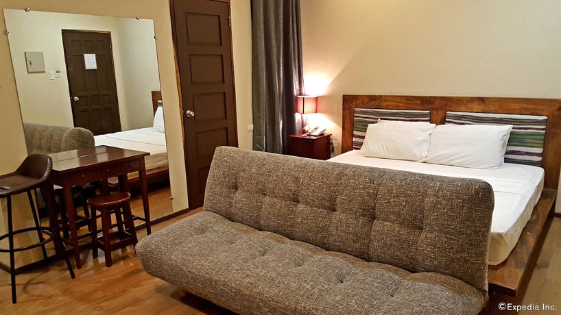 Imagen de la habitación del Hotel Golden Gate Suites. Foto 10
