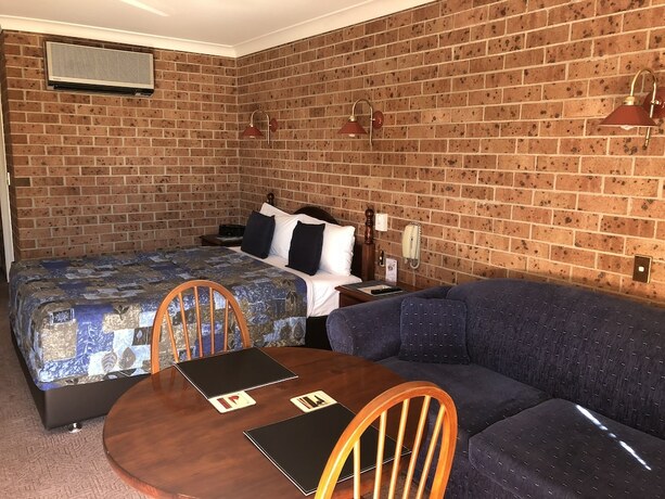 Imagen de la habitación del Hotel Golden Grain Motor Inn. Foto 16