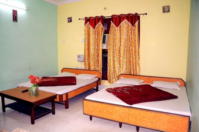 Imagen de la habitación del Hotel Golden, Haridwar. Foto 11