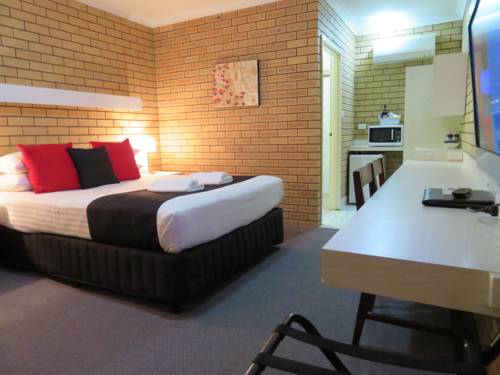 Imagen de la habitación del Hotel Golden Harvest Motor Inn. Foto 2