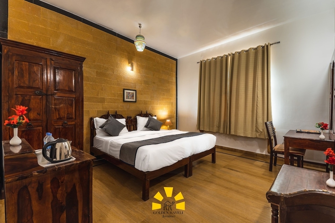 Imagen de la habitación del Hotel Golden Haveli. Foto 14