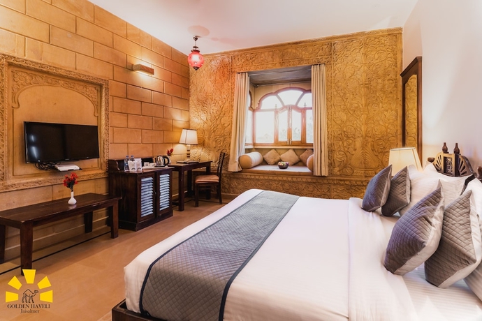Imagen de la habitación del Hotel Golden Haveli. Foto 16