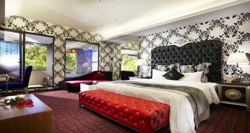 Imagen de la habitación del Hotel Golden Hotspring. Foto 11
