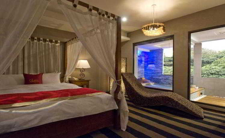 Imagen de la habitación del Hotel Golden Hotspring. Foto 12
