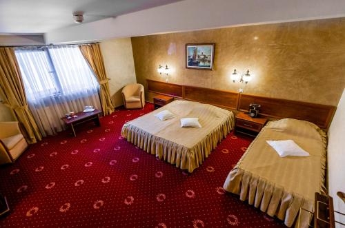 Imagen de la habitación del Hotel Golden House, Craiova. Foto 9