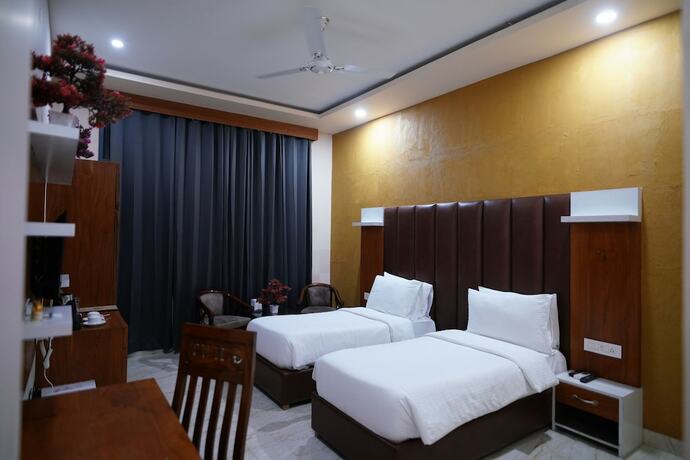 Imagen de la habitación del Hotel Golden Hut Derabassi. Foto 8