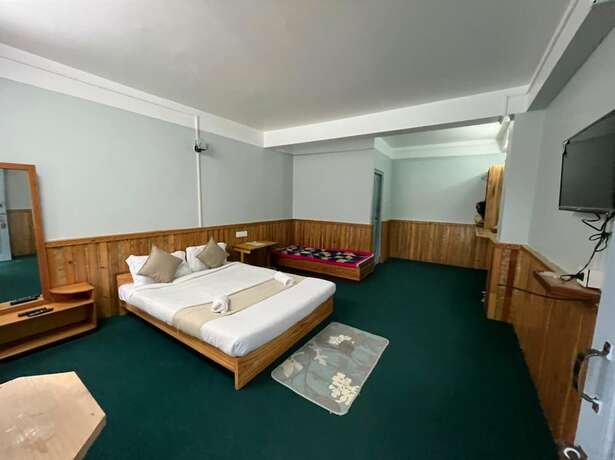 Imagen de la habitación del Hotel Golden Kang Lachen. Foto 9