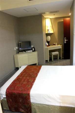 Imagen de la habitación del Hotel Golden Key International. Foto 7