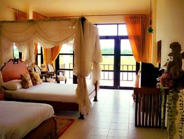 Imagen de la habitación del Hotel Golden Lake View Boutique Resort. Foto 7