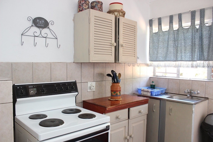 Imagen de la habitación del Hotel Golden Lantern Guest Lodge. Foto 16