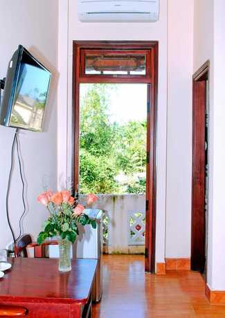 Imagen de la habitación del Hotel Golden Leaf Homestay. Foto 7