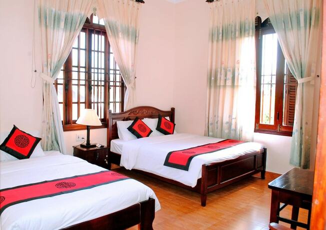 Imagen de la habitación del Hotel Golden Leaf Homestay. Foto 8